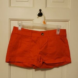 Bright red/orange shorts